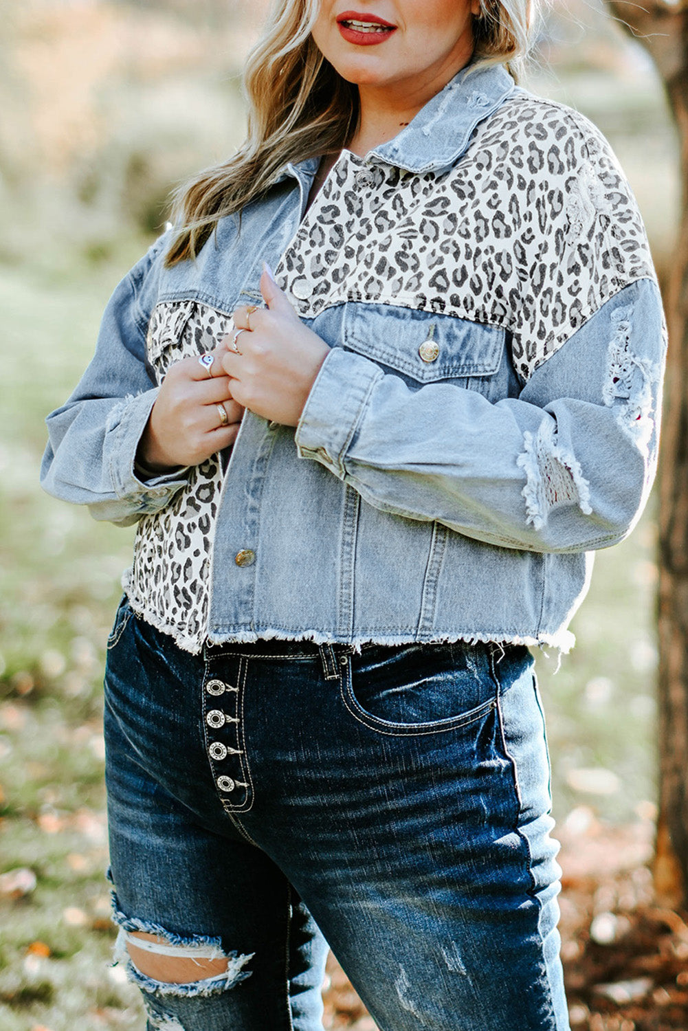 Ripped blue best sale denim jacket